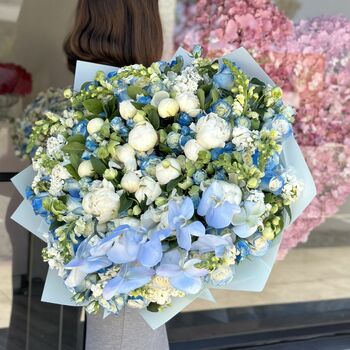 Peonies bouquet in blue
